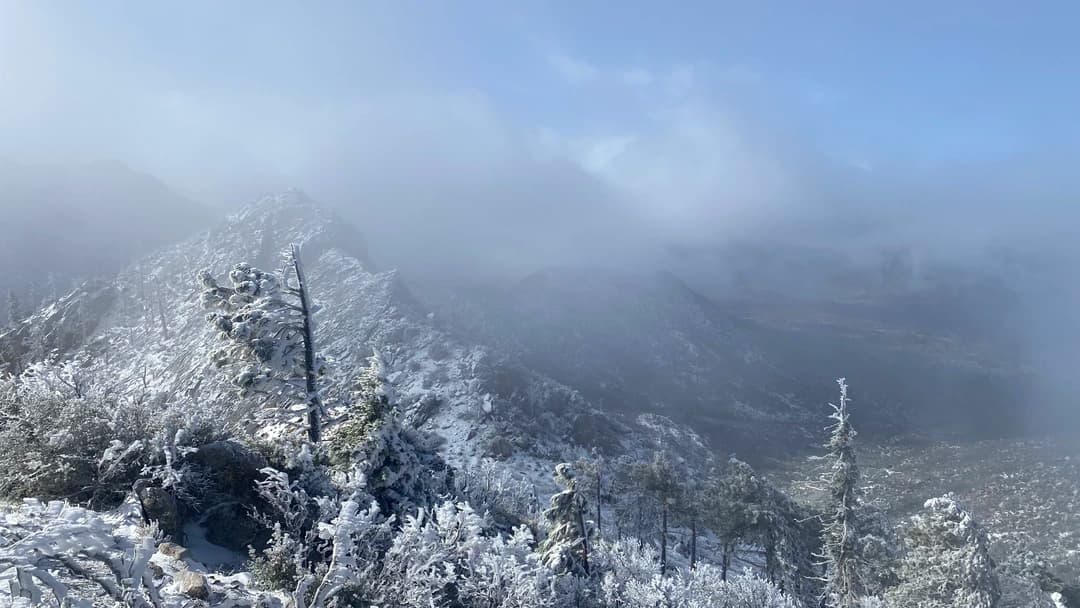 foggy snow covered mountains on the pacific coast trail